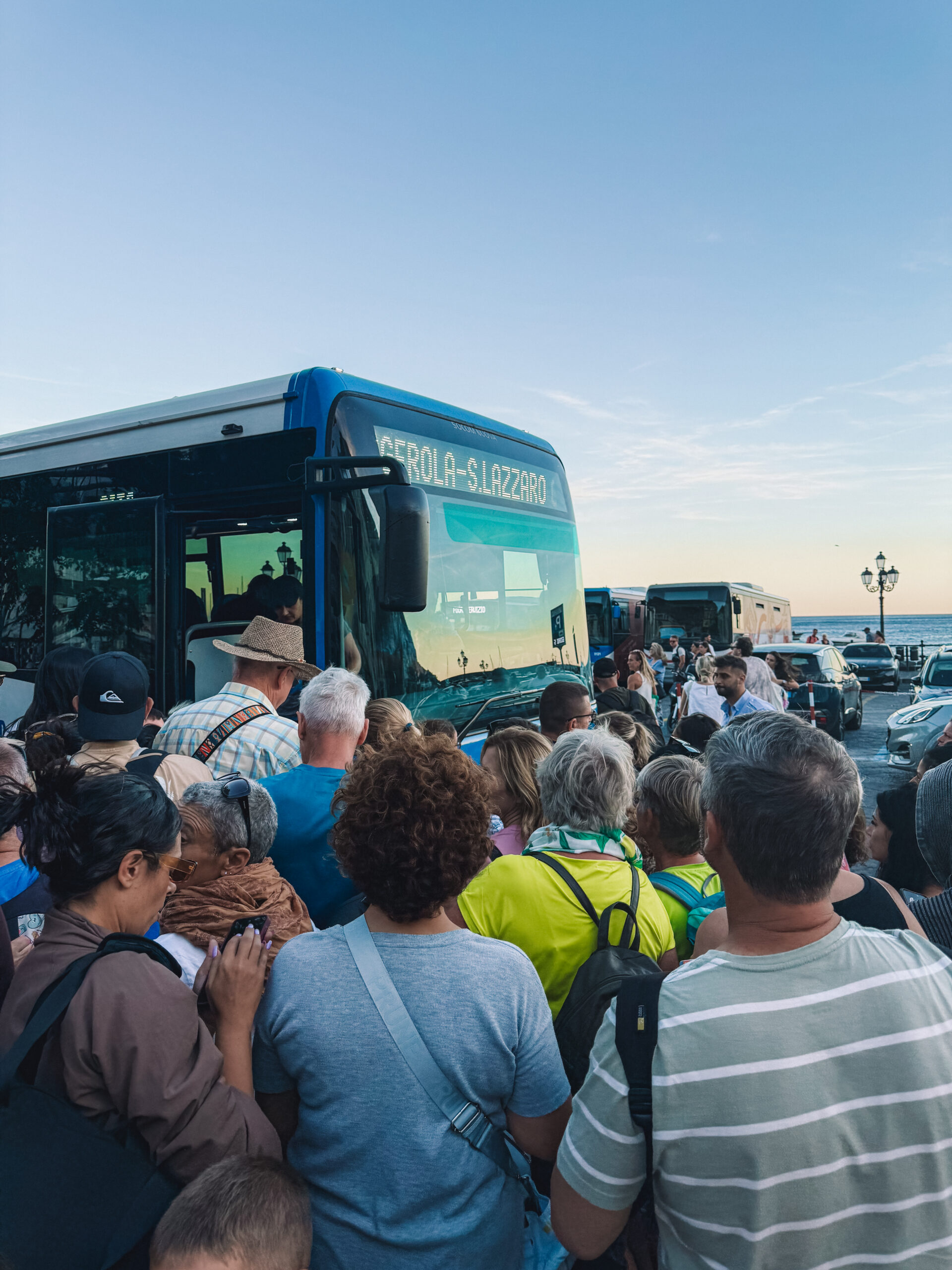 Crowded local SITA bus on the Amalfi Coast during summer travel season
