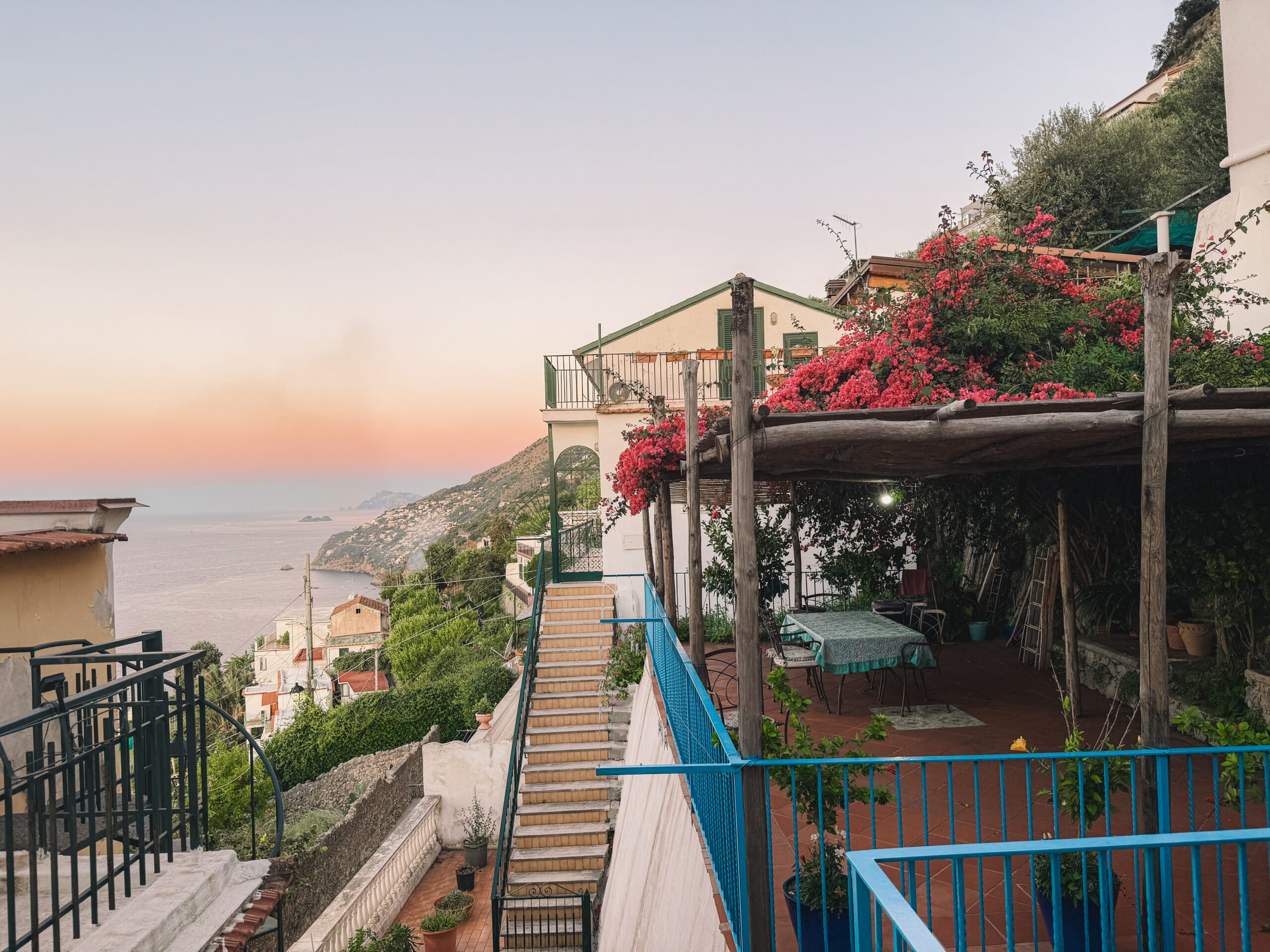 Sunset view from a terrace overlooking the Amalfi Coast in Italy